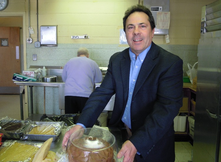 Chris with a delicious cake8 from Bishop Alejo's Visit on Saturday